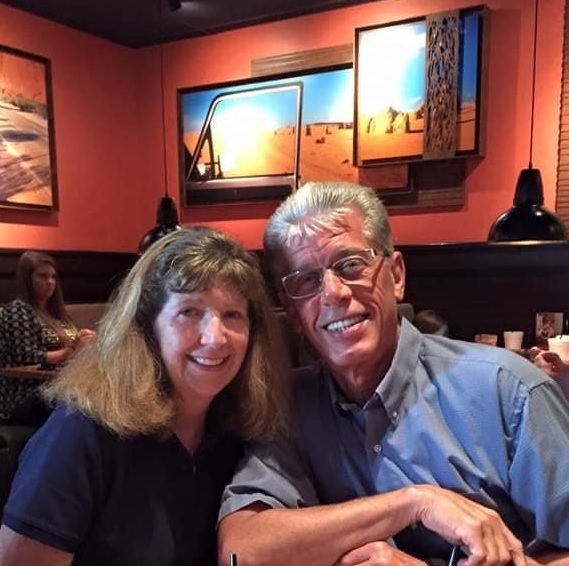 a man and a woman in a restaurant